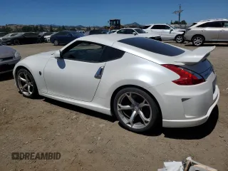 2011 Nissan 370Z Touring z VIN JN1AZ4EH7BM551606, wystawiony jako Copart lot #57173945 z przebiegiem Nie podano mil oraz Szkoda całkowita • Salvage title. Historia ofert i sprzedaży dostępna na DreamBid. Obrazek 2.