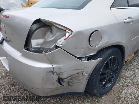 2006 Pontiac G6 6-Cyl z VIN 1G2ZG558064154096, wystawiony jako IAAI lot #41987316 z przebiegiem 221 130 mil mil oraz . Historia ofert i sprzedaży dostępna na DreamBid. Obrazek 19.