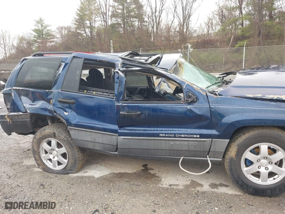 2002 Jeep Grand Cherokee Laredo with VIN 1J4GW48S82C321712, listed as a IAAI auction lot 41855809 with 1 mi miles. Bid and sale history available at carsss.com. Image 19.