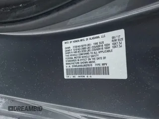 2018 Honda Odyssey Touring with VIN 5FNRL6H8XJB029570, listed as a IAAI auction lot 41485794 with 77,601 mi miles. Bid and sale history available at carsss.com. Image 9.