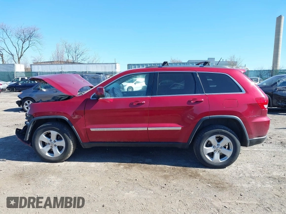 2012 Jeep Grand Cherokee Laredo with VIN 1C4RJFAG4CC297151, listed as a IAAI auction lot 41903618 with 222,357 mi miles. Bid and sale history available at carsss.com. Image 14.