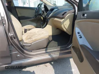 2013 Hyundai Accent GLS with VIN KMHCT4AE1DU358871, listed as a IAAI auction lot 42373080 with 150,443 mi miles and . Bid and sale history available at DreamBid. Image 5.