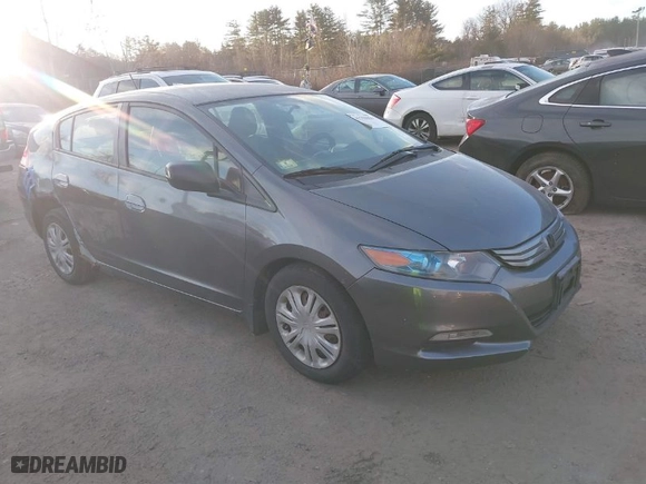 2010 Honda Insight LX with VIN JHMZE2H52AS014667, listed as a IAAI auction lot 41258620 with 138,419 mi miles. Bid and sale history available at carsss.com. Image 1.