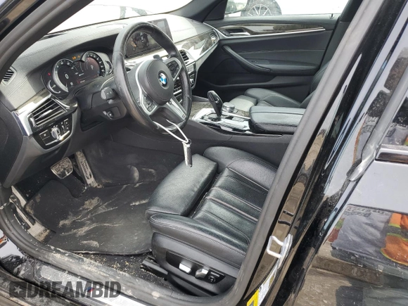 2018 BMW 5 Series 530e xDrive with VIN WBAJB1C51JG623953, listed as a Copart auction lot 51149905 with 86,799 mi miles and Salvage title. Bid and sale history available at DreamBid. Image 7.