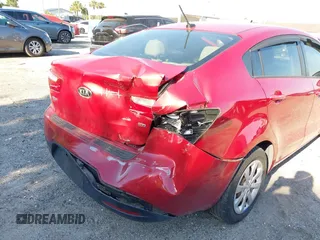 2014 Kia Rio LX with VIN KNADM4A35E6327324, listed as a IAAI auction lot 41893805 with 129,330 mi miles. Bid and sale history available at carsss.com. Image 6.