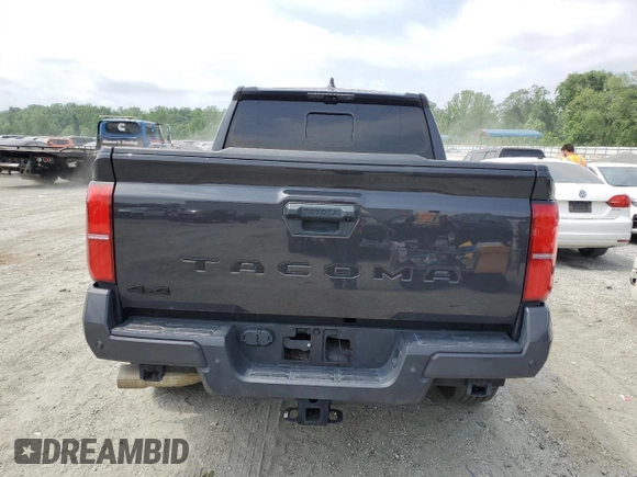2024 Toyota Tacoma SR5 z VIN 3TMLB5JN2RM017259, wystawiony jako Copart lot #55850015 z przebiegiem 29 596 mil mil oraz Szkoda całkowita • Salvage title. Historia ofert i sprzedaży dostępna na DreamBid. Obrazek 6.