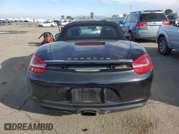 2014 Porsche Boxster with VIN WP0CA2A84ES121667, listed as a Copart auction lot 87510945 with 62,689 mi miles and Salvage title. Bid and sale history available at DreamBid. Image 6.