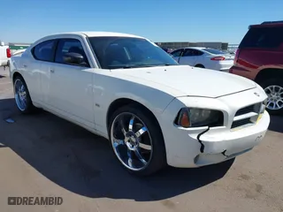 2009 Dodge Charger SXT with VIN 2B3KA33V99H515295, listed as a IAAI auction lot 41879006 with 207,230 mi miles. Bid and sale history available at carsss.com. Image 1.