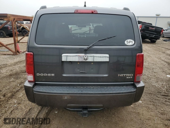 2011 Dodge Nitro SXT z VIN 1D4PT5GK0BW509907, wystawiony jako Copart lot #42716715 z przebiegiem 88 884 mil mil oraz Szkody całkowita. Historia ofert i sprzedaży dostępna na DreamBid. Obrazek 6.