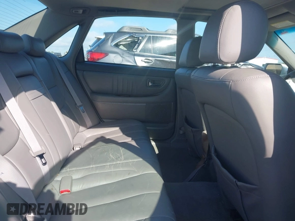 2004 Toyota Avalon XL z VIN 4T1BF28BX4U343188, wystawiony jako IAAI lot #42163107 z przebiegiem Nie podano mil oraz . Historia ofert i sprzedaży dostępna na DreamBid. Obrazek 8.
