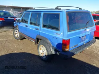 1996 Jeep Cherokee Sport with VIN 1J4FJ68S6TL171428, listed as a IAAI auction lot 40881632 with 323,289 mi miles. Bid and sale history available at carsss.com. Image 3.