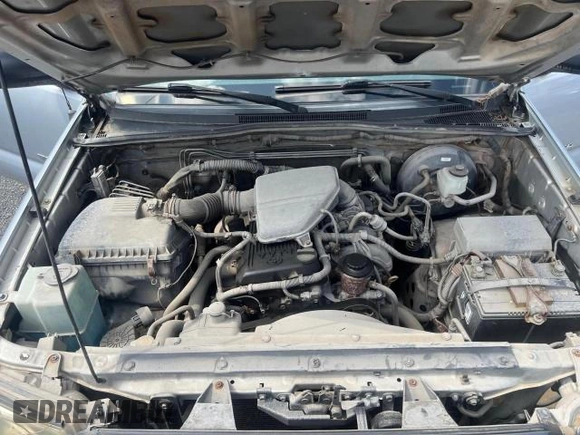 2012 Toyota Tacoma with VIN 5TFTX4CN0CX013172, listed as a Copart auction lot 64782915 with 147,168 mi miles and Clean title. Bid and sale history available at DreamBid. Image 7.
