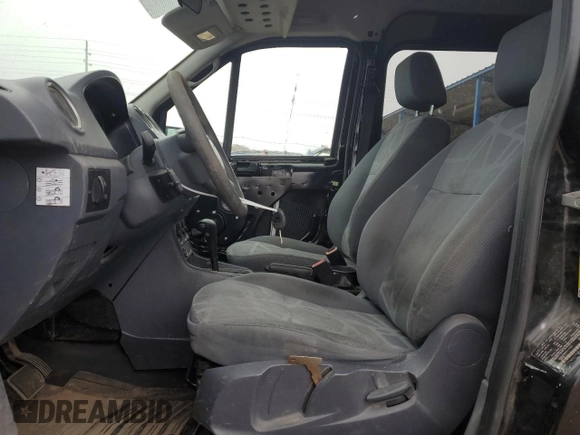 2012 Ford Transit Connect XLT z VIN NM0KS9BN5CT111837, wystawiony jako Copart lot #49271645 z przebiegiem 118 239 mil mil oraz Szkoda całkowita • Salvage title. Historia ofert i sprzedaży dostępna na DreamBid. Obrazek 7.