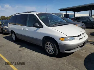 1998 Dodge Caravan LE with VIN 1B4GP54LXWB688630, listed as a Copart auction lot 74829544 with 209,157 mi miles and Salvage Title. Bid and sale history available at carsss.com. Image 4.
