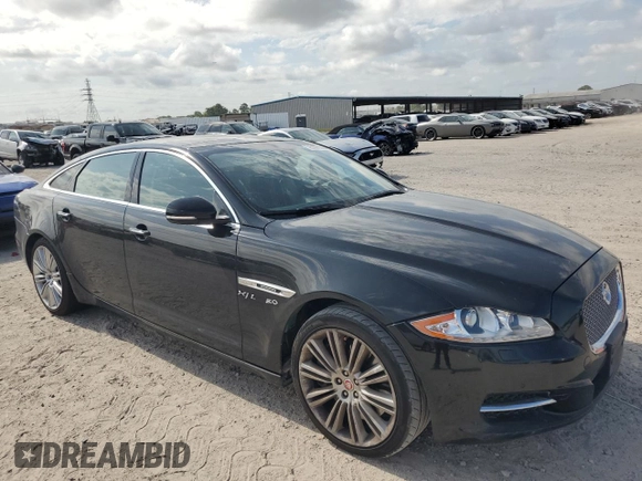 2014 Jaguar XJ with VIN SAJWA2GT0EMV61531, listed as a Copart auction lot 61071054 with 79,266 mi miles and Clean Title. Bid and sale history available at DreamBid. Image 4.