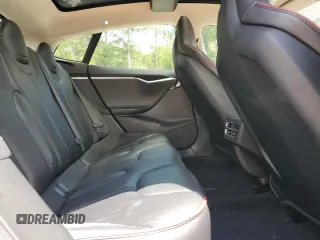 2013 Tesla Model S Performance с VIN 5YJSA1CP8DFP20786, выставлен на аукционе Copart как лот 61035395 с пробегом 140 119 миль миль и Списание • Salvage title. История ставок и продаж доступна на DreamBid. Изображение 10.