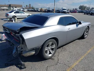 2017 Dodge Challenger SXT Plus with VIN 2C3CDZAG5HH502354, listed as a IAAI auction lot 41740550 with 131,860 mi miles and . Bid and sale history available at DreamBid. Image 4.