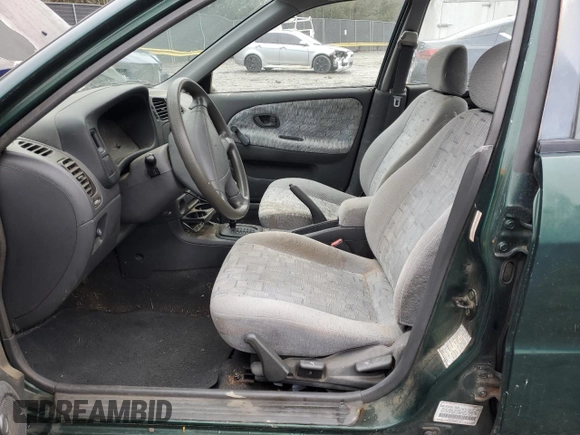 1998 Mitsubishi Mirage DE z VIN JA3AY26A2WU042095, wystawiony jako Copart lot #84700394 z przebiegiem 124 362 mil mil oraz Czysty tytuł • Clean title. Historia ofert i sprzedaży dostępna na DreamBid. Obrazek 7.