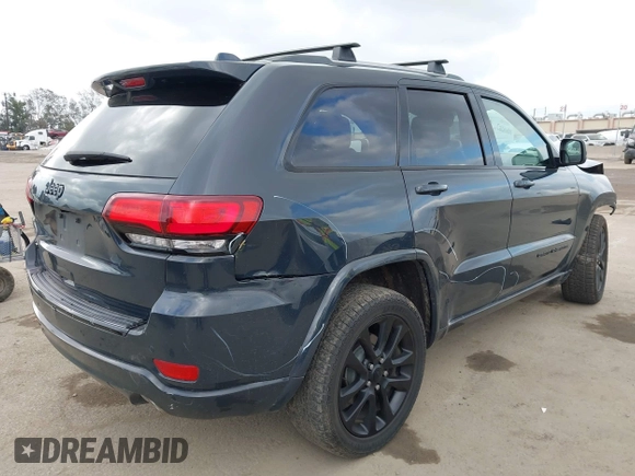2018 Jeep Grand Cherokee Altitude with VIN 1C4RJFAG4JC122282, listed as a IAAI auction lot 42126483 with 79,184 mi miles and . Bid and sale history available at DreamBid. Image 4.