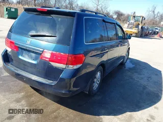 2010 Honda Odyssey EX-L with VIN 5FNRL3H76AB058912, listed as a IAAI auction lot 41558361 with 206,841 mi miles and . Bid and sale history available at DreamBid. Image 4.