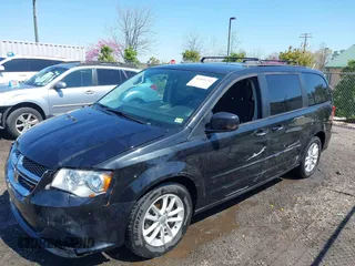 2015 Dodge Grand Caravan SXT with VIN 2C4RDGCG6FR548774, listed as a IAAI auction lot 41901232 with 141,589 mi miles and . Bid and sale history available at DreamBid. Image 2.