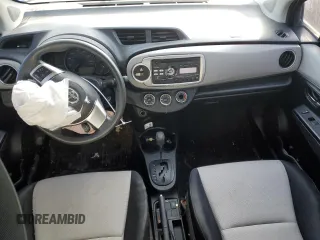 2012 Toyota Yaris L with VIN JTDKTUD30CD527660, listed as a Copart auction lot 42512405 with Not Provided miles and Salvage Title. Bid and sale history available at DreamBid. Image 8.