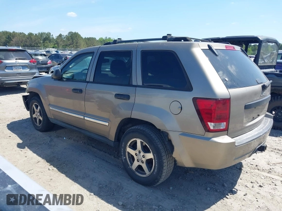 2005 Jeep Grand Cherokee Laredo with VIN 1J4HS48NX5C656582, listed as a IAAI auction lot 42079746 with Not Provided miles and . Bid and sale history available at DreamBid. Image 14.