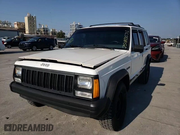 1996 Jeep Cherokee SE with VIN 1J4FT28S3TL197827, listed as a Copart auction lot 75443574 with 116,660 mi miles and Salvage Title. Bid and sale history available at carsss.com. Image 12.