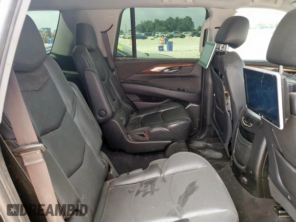 2018 Cadillac Escalade z VIN 1GYS3AKJ6JR256100, wystawiony jako Copart lot #57900755 z przebiegiem 129 775 mil mil oraz Szkoda całkowita • Salvage title. Historia ofert i sprzedaży dostępna na DreamBid. Obrazek 11.