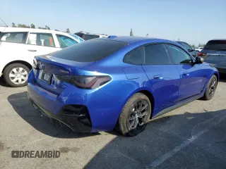 2024 BMW i4 M50 with VIN WBY33AW07RFS19600, listed as a Copart auction lot 53030904 with 1,985 mi miles and Salvage Title. Bid and sale history available at carsss.com. Image 3.