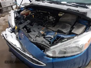 2018 Ford Focus SE z VIN 1FADP3F26JL312725, wystawiony jako IAAI lot #41488559 z przebiegiem 30 686 mil mil oraz . Historia ofert i sprzedaży dostępna na DreamBid. Obrazek 17.