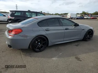 2015 BMW M6 z VIN WBS6C9C58FD467819, wystawiony jako Copart lot #70903944 z przebiegiem 85 596 mil mil oraz Szkoda całkowita • Salvage title. Historia ofert i sprzedaży dostępna na DreamBid. Obrazek 3.