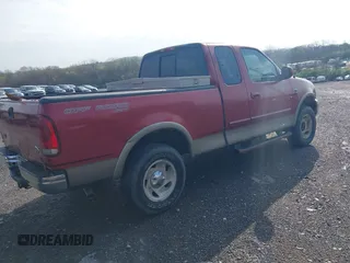 2001 Ford F-150 XL with VIN 1FTRX18L41KF38469, listed as a IAAI auction lot 41954075 with 219,967 mi miles. Bid and sale history available at carsss.com. Image 4.