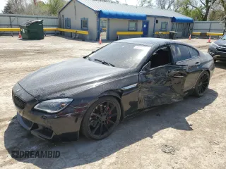 2016 BMW 6 Series 650i xDrive z VIN WBA6D6C57GG388027, wystawiony jako Copart lot #53157535 z przebiegiem 52 147 mil mil oraz Szkody całkowita. Historia ofert i sprzedaży dostępna na DreamBid. Obrazek 1.