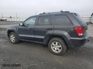 2010 Jeep Grand Cherokee Laredo with VIN 1J4RR4GT7AC120604, listed as a Copart auction lot 84257724 with 60,827 mi miles and Salvage Title. Bid and sale history available at carsss.com. Image 2.
