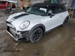 2014 MINI Hardtop S with VIN WMWXM7C57ET985421, listed as a Copart auction lot 49443335 with 76,168 mi miles and Salvage Title. Bid and sale history available at DreamBid. Image 1.