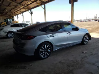 2023 Honda Civic EX-L z VIN 19XFL1H77PE004072, wystawiony jako Copart lot #49524855 z przebiegiem 21 100 mil mil oraz Szkoda całkowita • Salvage title. Historia ofert i sprzedaży dostępna na DreamBid. Obrazek 3.