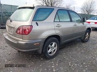 1999 Lexus RX 300 Luxury SUV with VIN JT6HF10U7X0090467, listed as a IAAI auction lot 41792768 with 263,408 mi miles. Bid and sale history available at carsss.com. Image 4.