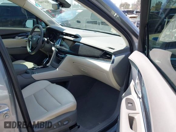 2023 Cadillac XT6 FWD Premium Luxury with VIN 1GYKPCRS6PZ163018, listed as a IAAI auction lot 42437403 with 21,366 mi miles and . Bid and sale history available at DreamBid. Image 5.