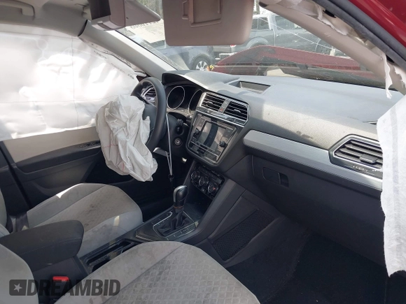 2018 Volkswagen Tiguan S with VIN 3VV1B7AX3JM128705, listed as a IAAI auction lot 42110808 with 60,589 mi miles and . Bid and sale history available at DreamBid. Image 5.