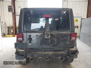 2017 Jeep Wrangler Unlimited Sahara with VIN 1C4BJWEG8HL638067, listed as a IAAI auction lot 41274352 with 57,339 mi miles. Bid and sale history available at carsss.com. Image 16.