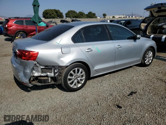 2014 Volkswagen Jetta SE с VIN 3VWD17AJ9EM437088, выставлен на аукционе Copart как лот 64810275 с пробегом 92 165 миль миль и Списание • Salvage title. История ставок и продаж доступна на DreamBid. Изображение 3.