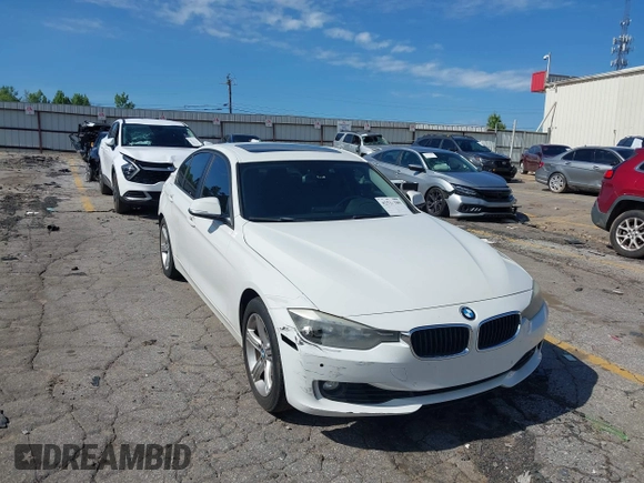 2014 BMW 3 Series 328i with VIN WBA3A5C58EP602669, listed as a IAAI auction lot 42514389 with 187,330 mi miles and . Bid and sale history available at DreamBid. Image 1.