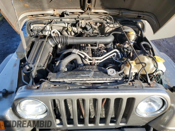 2004 Jeep Wrangler Sport z VIN 1J4FA49SX4P723705, wystawiony jako Copart lot #46944215 z przebiegiem 157 731 mil mil oraz Czysty tytuł • Clean title. Historia ofert i sprzedaży dostępna na DreamBid. Obrazek 12.