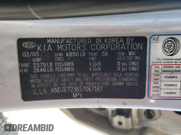 2005 Kia Sportage LX with VIN KNDJE723657067187, listed as a Copart auction lot 57403525 with 228,648 mi miles and Clean title. Bid and sale history available at DreamBid. Image 13.