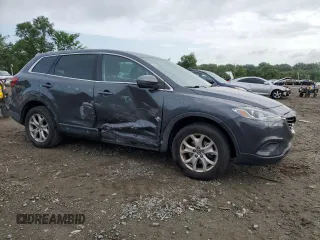 2015 Mazda CX-9 Touring z VIN JM3TB2CA2F0452202, wystawiony jako Copart lot #60407215 z przebiegiem 158 373 mil mil oraz Szkoda całkowita • Salvage title. Historia ofert i sprzedaży dostępna na DreamBid. Obrazek 4.