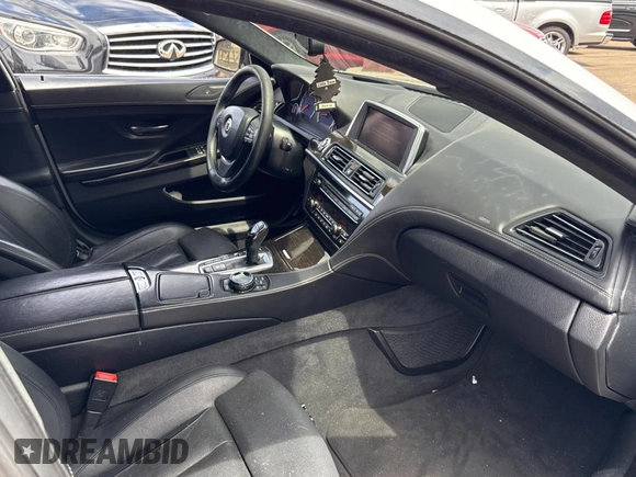 2015 BMW 6 Series 650i xDrive with VIN WBA6B4C57FD899926, listed as a Copart auction lot 54974505 with 63,570 mi miles and Salvage Title. Bid and sale history available at carsss.com. Image 5.