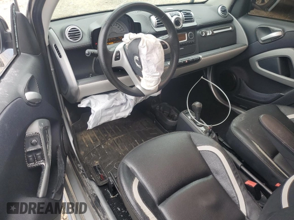 2015 Smart fortwo Passion z VIN WMEEJ3BA9FK791881, wystawiony jako Copart lot #43876595 z przebiegiem 56 699 mil mil oraz Szkody całkowita. Historia ofert i sprzedaży dostępna na DreamBid. Obrazek 8.