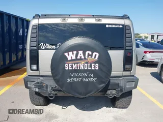 2003 Hummer H2 with VIN 5GRGN23U43H125114, listed as a IAAI auction lot 42160986 with 157,776 mi miles. Bid and sale history available at carsss.com. Image 16.