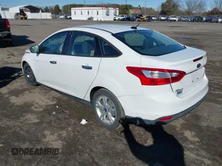 2014 Ford Focus SE with VIN 1FADP3F21EL119923, listed as a IAAI auction lot 41585170 with 126,266 mi miles. Bid and sale history available at carsss.com. Image 3.